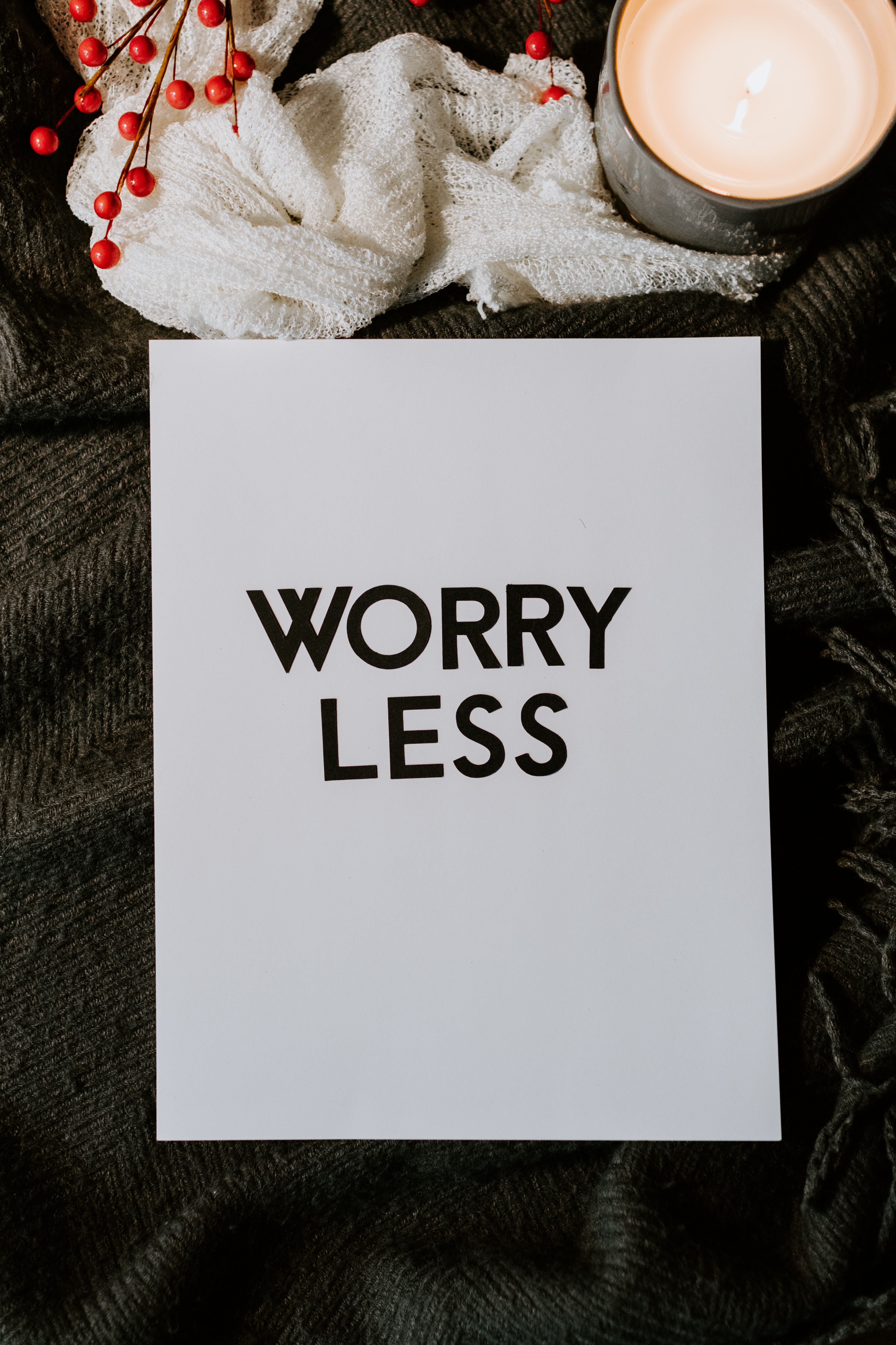 worry less printed on piece on paper